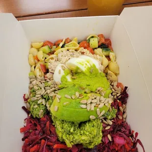 Power salad w/ 1 scoop beet salad, 1 scoop daily pasta salad, 1 scoop tuna, 1 scoop pesto chicken along side a ginger, turmeric iced tea!