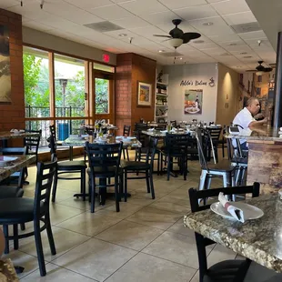 a restaurant with tables and chairs