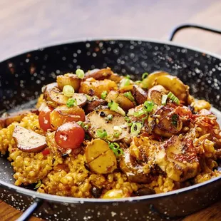 Paella
confit mushroom, saffron tomato rice, seaweed