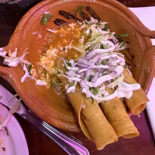 Chicken Flautas. The sauces is excellent.