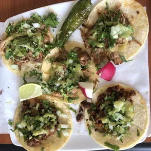 Carnitas and chorizo tacos! Sooo good! Add the green sauce.