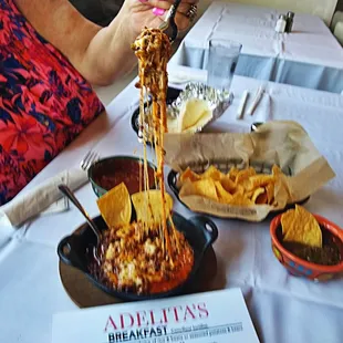 a woman eating a meal