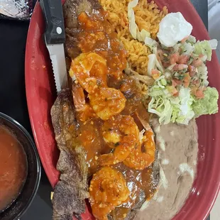 Then steak, shrimp, refried beans and rice