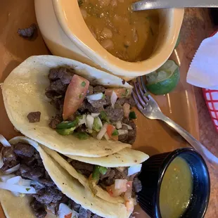 Asada and Barbacoa tacos, loved the side of beans