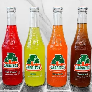 three bottles of taqueria