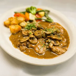 Veal Scaloppine Marsala &amp; Mushrooms. Served with Roasted Potatoes &amp; Sauteed Vegetables