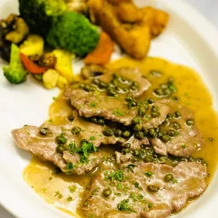 Veal Scaloppine Limone, Lemon, Butter, Caper Sauce Served with Roasted Potatoes &amp; Sauteed Vegetables