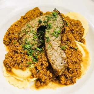 Beef Ravioli with Homemade Beef Bolognese Topped with Jimmy's Italian Sausage