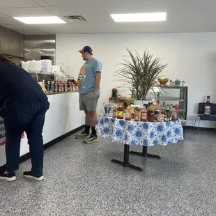 a man and a woman at a counter