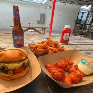 Veggie burger, cider, fries and cauliflower bites with ranch dressing