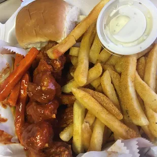 Overcooked fried wings. Sauce from Sysco frozen fries. Roll from a bag. How is this supposed to be so good?