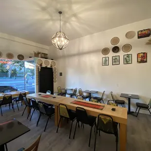 a dining room with tables and chairs