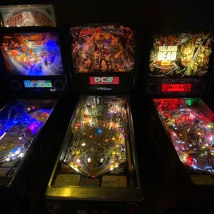 a row of pinball machines