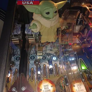 Look closely at the picture, notice anything beyond the baby Yoda?