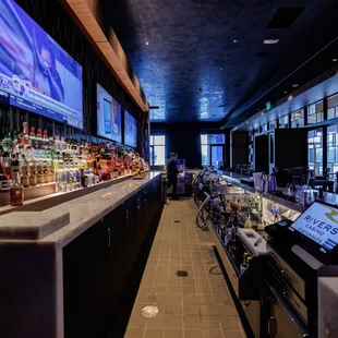 a bar with a large screen