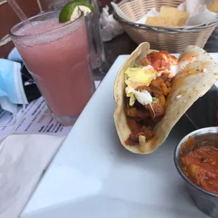 Al pastor taco, chips, and Margarita.