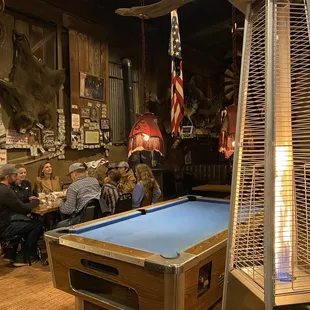 a billiards table in a restaurant