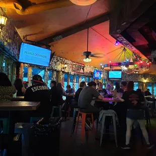 people sitting at a bar