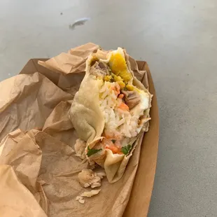 Gross... i had the odoburrito, basically they wrap plan riz with gross chicken. Apparently looks like there is an egg too