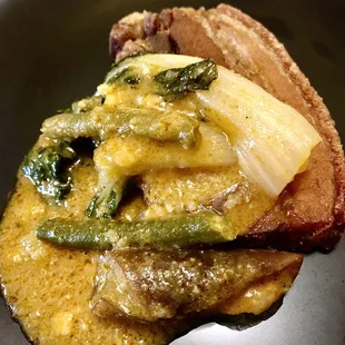 Bagnet Kare Kare plated after so the fried pork belly doesn&apos;t get soggy