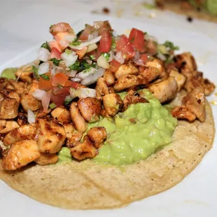 Pollo Asado Taco (Grilled Chicken Taco) - Served with Housemade Guacamole and Housemade Pico de Gallo in a Large Corn Tortilla