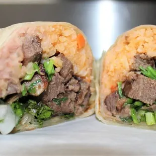 Lengua Burrito ( Cows Tounge ,Mexican Rice, Refried Pinto Beans, Cilantro and Onions)