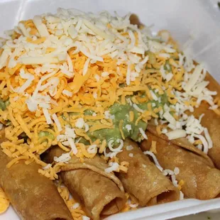 5 Rolled Taquitos with Guacamole. ( your choice of Shredded Beef or Shredded Chicken)