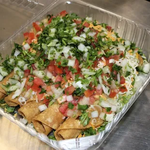 5 Rolled Taquitos with Cheese and Guacamole. ( Added toppings are : Cilantro Onion and Pico de Gallo.