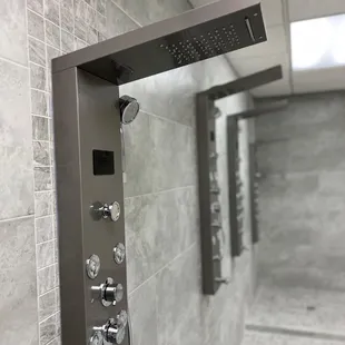 a shower head and hand shower