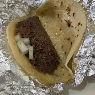 Barbacoa with onion and cilantro on flour (generous portion!)