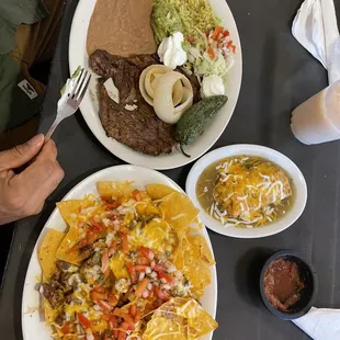 Steak nachos (no sour cream or guacamole) and Carne Asada with a chili relleno on the side!