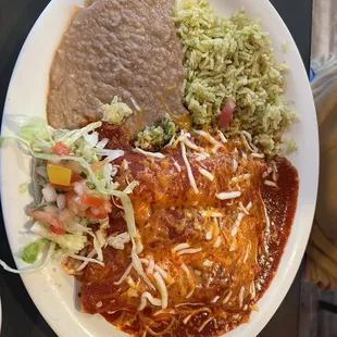 Chicken tamales with refried beans, Mexican rice and pico de gallo