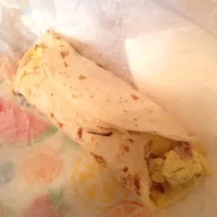 a burrito wrapped in paper