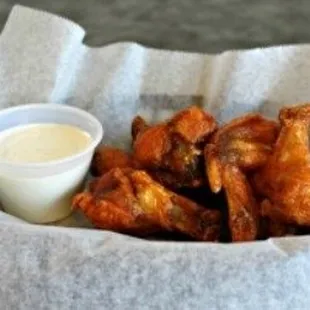 a basket of chicken wings
