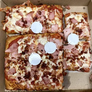 Sicilian pizza with bacon and ham