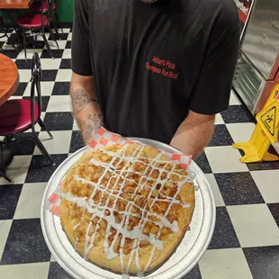 Our apple Pie Pizza, with caramel or white chocolate, is a delicious treat!