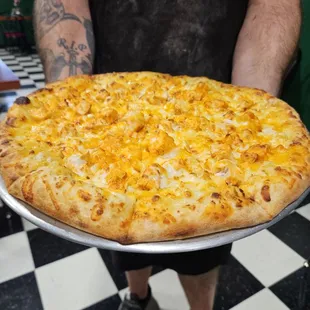 Mac and cheese pizza - the ultimate in comfort food.