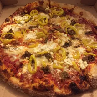 Meatballs, banana peppers and various cheeses. Pretty enjoyable.