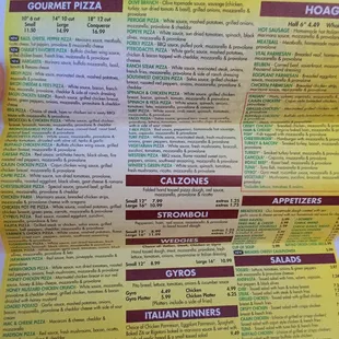 The backside of their menu with prices. Lots of weird pizzas.