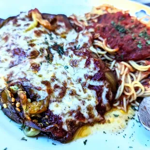 Eggplant Parmesan in a blue light hue