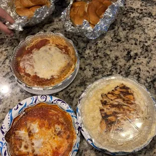 Bread knots, Chicken Parmigiana, Beef Lasagna, Chicken  fettuccine Alfredo.