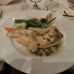 Sea Bass on white wine and capers sauce