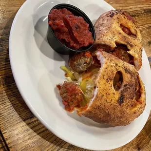 a plate of food on a wooden table