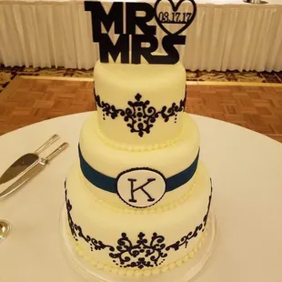 Our beautiful wedding cake from Adrienne's! A different flavor in each layer.