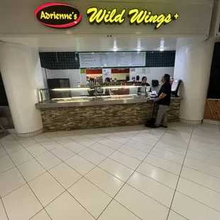 a man sitting at a counter