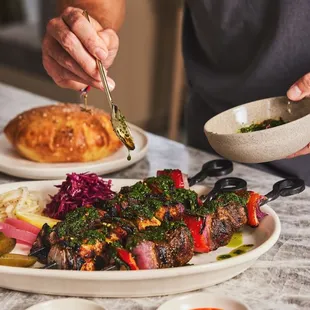 a man preparing a plate of food