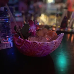 a bowl of food on a bar