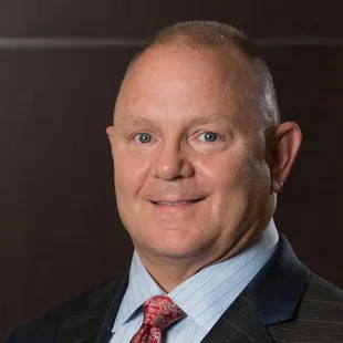Bruce E. Lundak, MD - Board Certified Urologist