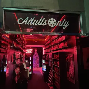 the inside of a store with neon lights