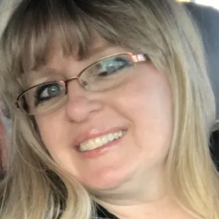 Elaine E.